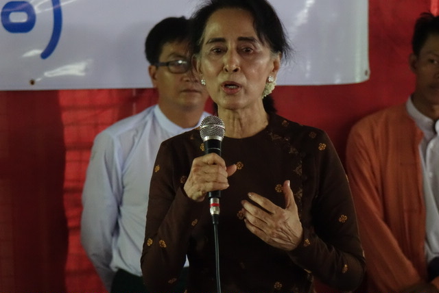 Burmese police request background check on Suu Kyi