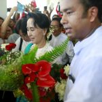 Myanmar pro-democracy leader Aung San Suu Kyi arrives at Thandwe Airport during her campaign rally for the upcoming general elections in Thandwe