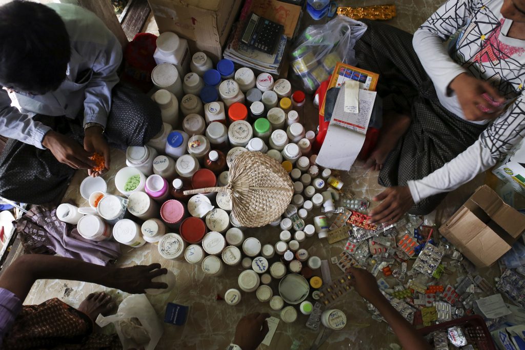 Traditional and western medicines mixed up at a makeshift clinic at the Thae Chaung camp for internally displaced people in Sittwe, Arakan State PHOTO: Reuters