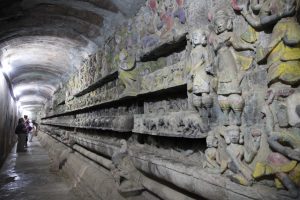 Intricate carvings of Buddhist scenes are seen in the hallways of the Sitthaung Temple in Mrauk-U. (Photo: Thin Lei Win / Myanmar Now)