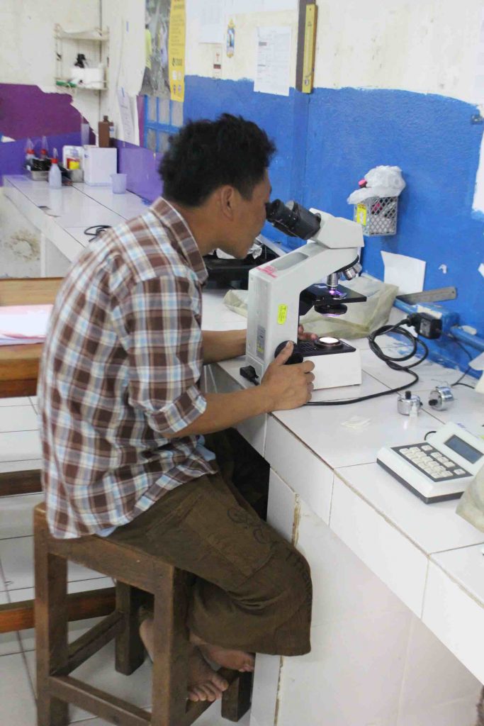 Man at work in lab of Mae Tao Clinic. (Photo: Libby Hogan)
