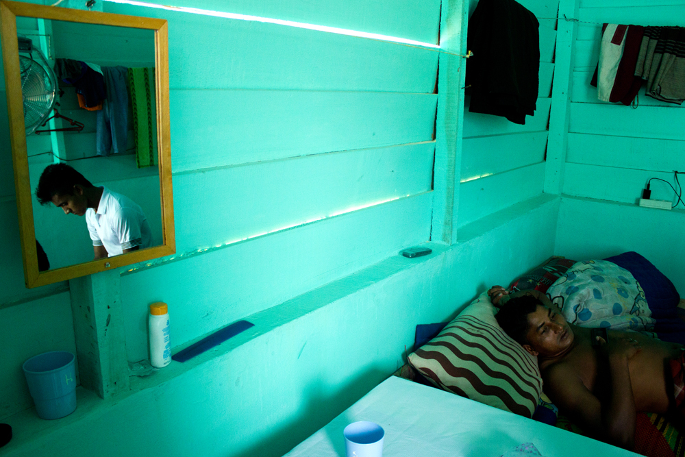 Rohingya refugees take some rest in their room at Timbang Refugee Camp, in the outskirts of Langsa City (Aceh Province, Indonesia). Photo: Carlos Sardiña Galache / Yayasan Geutanyoe – A Foundation for Aceh.