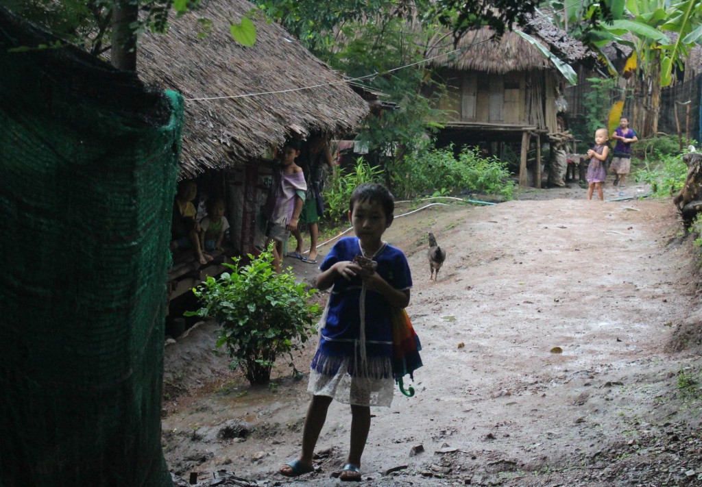 A child leading his home to walk to school. (Photo: Libby Hogan / DVB)