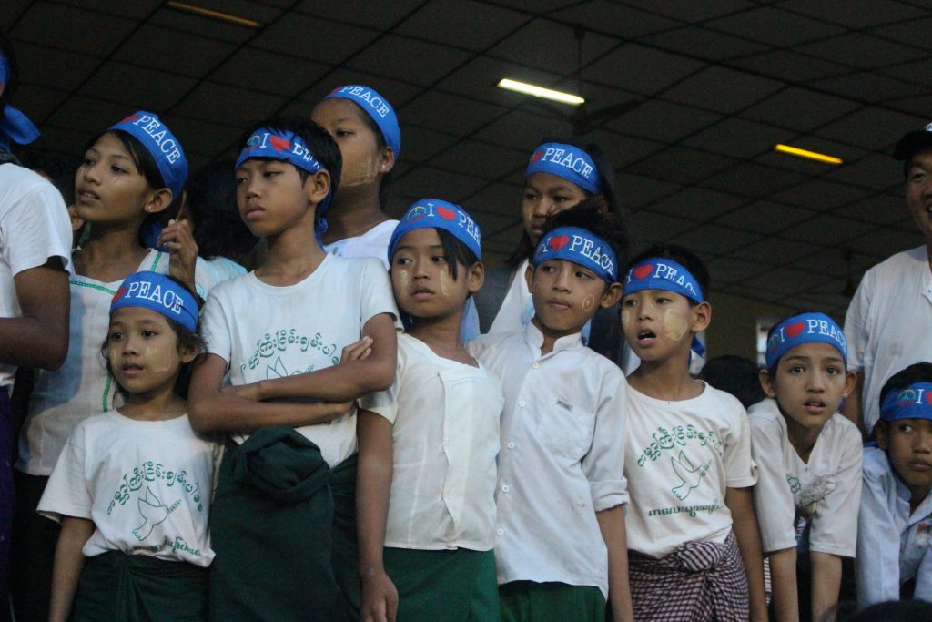 Youth watching an intense moment of the match. (Photo: Libby Hogan / DVB)