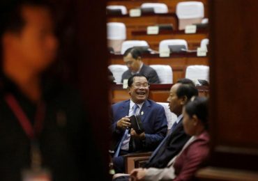 Cambodia MPs back change that bars leader’s rival