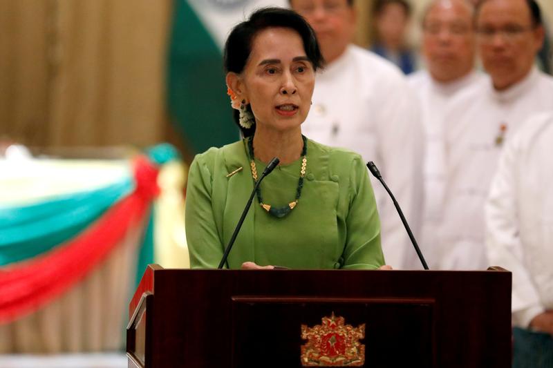 Suu Kyi says Burma trying to protect all citizens in strife-torn west