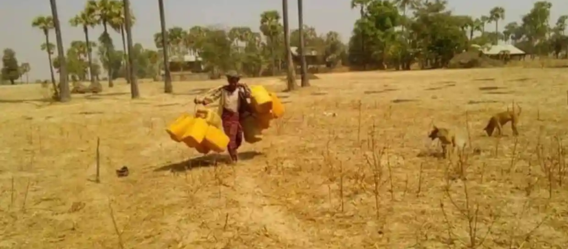 Coup, Covid, climate: the triple threat chasing citizens from Myanmar’s rice bowl
