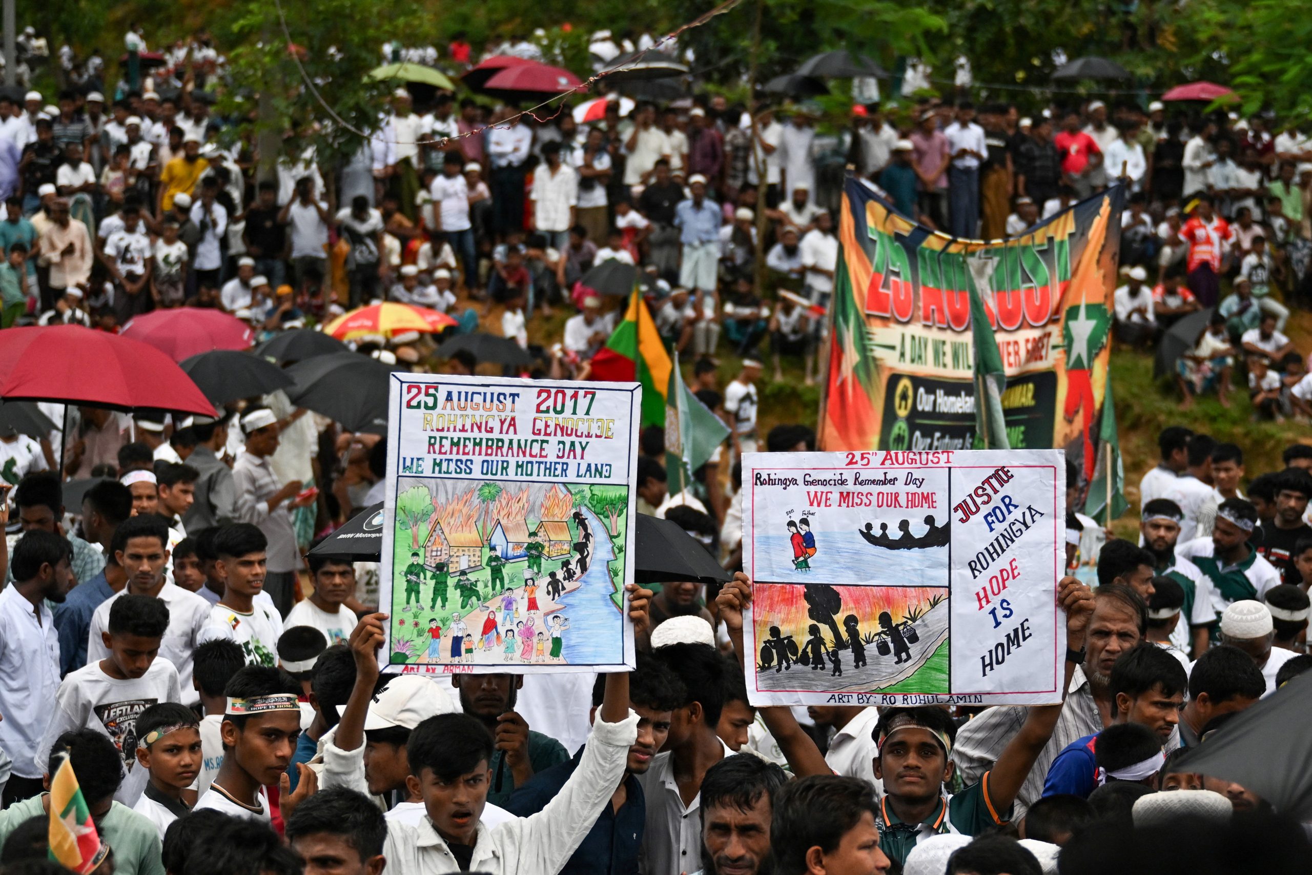 Rohingya refugees rally in Bangladesh camps to demand safe return to Myanmar