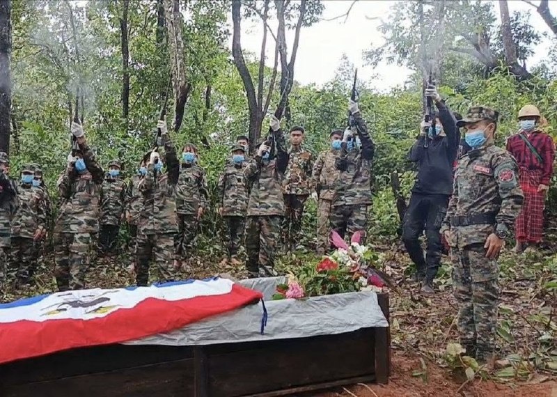 CDF-Asho fighters fire rifles into the air during the funeral for Commander-in-Chief Salai Yoe Chin and two others killed in a junta ambush in Ngape Township, Magway Region.